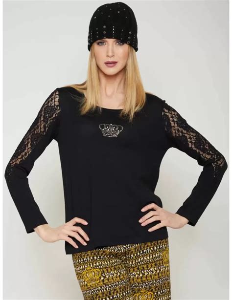 Maglia nera con rete e strass 